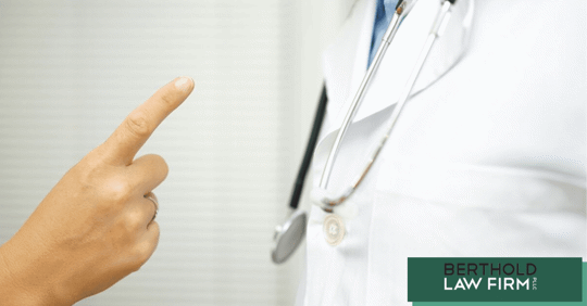 Finger pointing at doctor