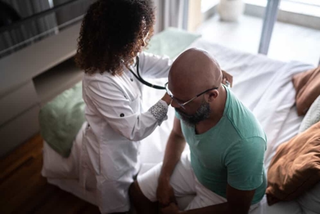 Patient has his heart checked by a doctor in a hospital