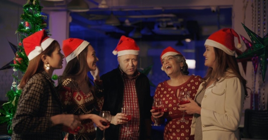 people celebrating at company holiday party