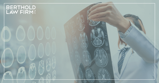 Doctor Looking at Brain Scan